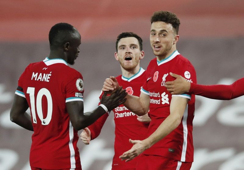 Liverpool's Diogo Jota celebrates scoring their second goal with teammates Pool via REUTERS/Clive Brunskill