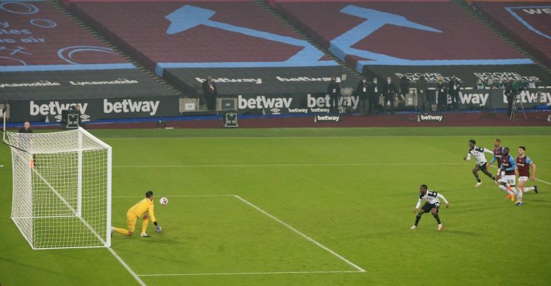 West Ham United's Lukasz Fabianski saves a penalty from Fulham's Ademola Lookman Pool via REUTERS/Catherine Ivill