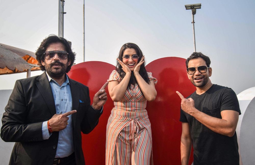 Gorakhpur: Actor and Gorakhpur MP Ravi Kishan with actors Amrapali Dubey and Dinesh Lal Yadav during an event, in Gorakhpur, Saturday, Dec. 5, 2020. (PTI Photo)