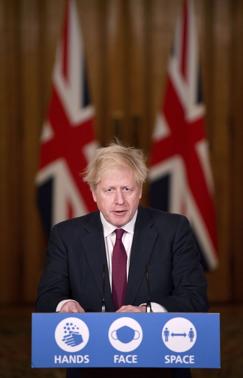 Britain's Prime Minister Boris Johnson speaks during a news conference in response to the ongoing situation with the coronavirus (COVID-19) pandemic, inside 10 Downing Street, London on December 19, 2020. Johnson says Christmas gatherings can't go ahead and non-essential shops must close in London and much of southern England as he imposed a new, higher level of coronavirus restrictions to curb rapidly spreading infections. (AP/PTI Photo)