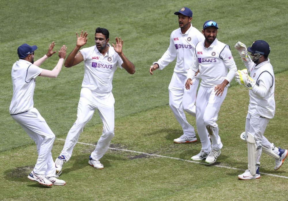 Melbourne:India's Ravichandran Ashwin, second left, celebrates with teammates after dismissing Australia's Marnus Labuschagne during play on day three of the second cricket test between India and Australia at the Melbourne Cricket Ground, Melbourne, Australia, Monday, Dec. 28, 2020. AP/PTI Photo