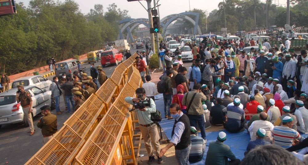 Members of Bharatiya Kisan Union during their 'Delhi Chalo' protest march against the Centre's new farm laws, in Noida, Wednesday, Dec. 2, 2020. (PTI Photo)