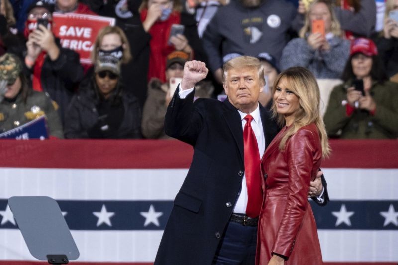 President Donald Trump and first lady Melania Trump prepare to leave a rally for U.S. Senators Kelly Loeffler, R-Ga., and David Perdue, R-Ga., who are both facing runoff elections on December 5, 2020, in Valdosta, Ga. (AP/PTI Photo)