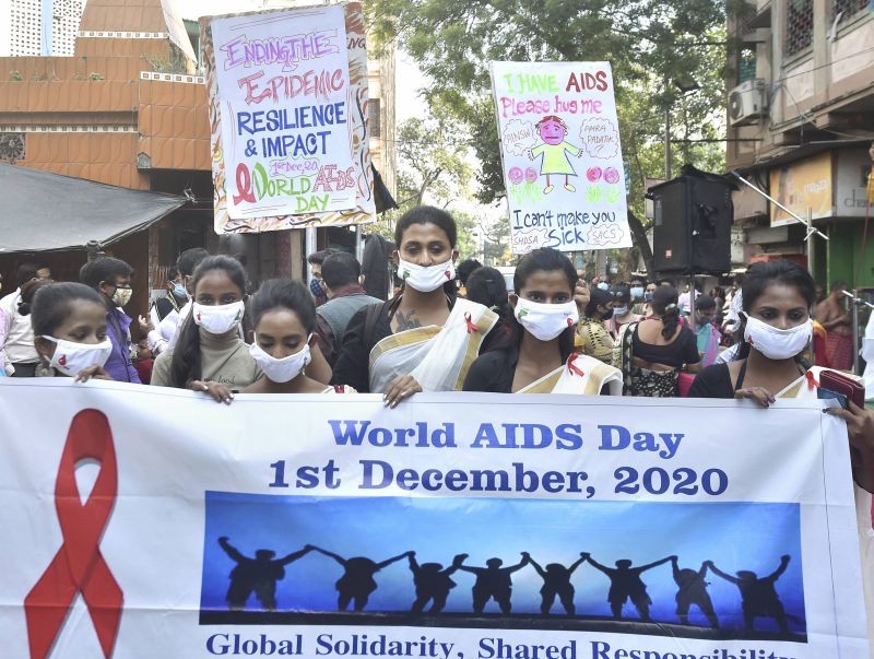 Kolkata: Women from Sonagachi red light area take part in an awareness programme to mark the World AIDS Day, in Kolkata, Tuesday, Dec 1, 2020. (PTI Photo)