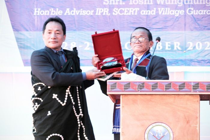 Advisor Toshi Wungtung with Nungsanglemba, President, CKS release the jubilee souvenir during the Chang Khulei Setshang (Chang Tribal Council) platinum jubilee celebration held in Tuensang on December 28 and 29. (Morung Photo)