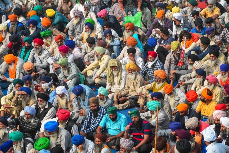 Farmers during their agitation against the Center's new farm laws, at Singhu border in New Delhi, Monday, Dec. 7, 2020. (PTI Photo/Shahbaz Khan)