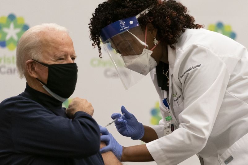 President-elect Joe Biden receives his first dose of the coronavirus vaccine from Nurse partitioner Tabe Mase at Christiana Hospital on live television in Newark Del., on December 21, 2020. (AP/PTI Photo)
