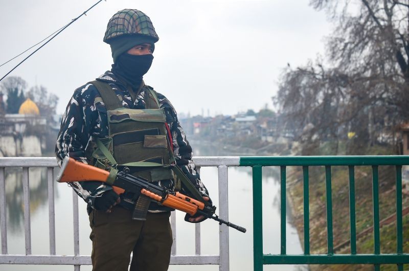 Srinagar: A CRPF personnel stands guard at a check point, in Srinagar, Wednesday, Dec. 9, 2020. Four civilians were injured in a grenade explosion at Singapore Pattan in Baramulla District of North Kashmir and in an other incident three Al-Badar militants were killed in an encounter with security forces in Pulwama District of South Kashmir. (PTI Photo)