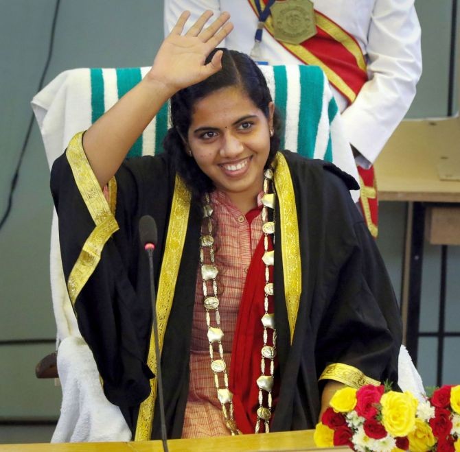 21-yr old Arya Rajendran, the youngest mayor in Thiruvananthapuram Municipal Corporation, greets members after taking her oath. Photograph: PTI Photo
