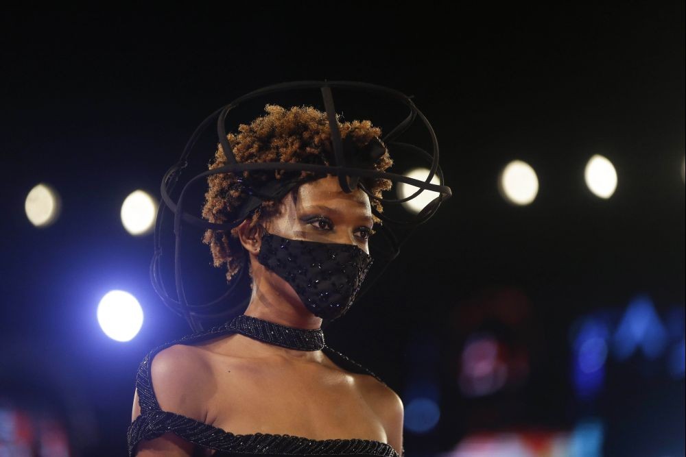 Lagos:  A model displays an outfit by designer DNA BY ICONIC INVANITY during the ARISE Fashion Week event in Lagos, Nigeria early Saturday , Dec 12, 2020. AP/PTI
