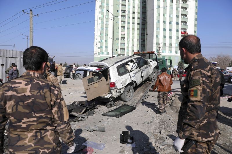 Afghan security personnel inspect the site of a bomb attack in Kabul, Afghanistan on December 15, 2020. A bombing and a shooting attack on Tuesday in the Afghan capital of Kabul killed a few people, including a deputy provincial governor, officials said. (AP/PTI Photo)