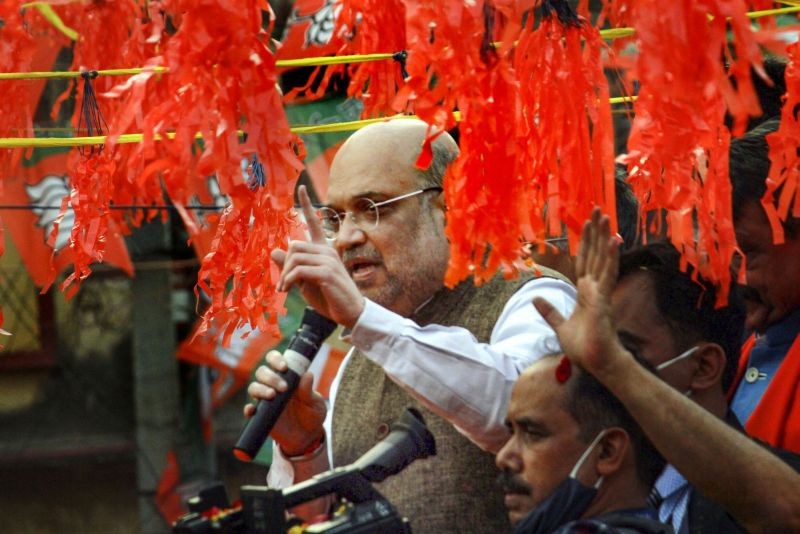 Birbhum: Union Home Minister Amit Shah during a roadshow ahead of West Bengal assembly polls 2021, at Bolpur in Birbhum district, Sunday, Dec. 20, 2020. (PTI Photo)(