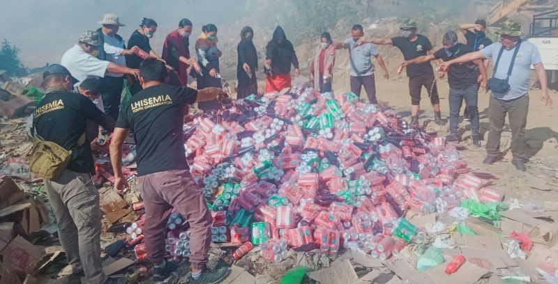 LYO along with LC and LK officials during the destruction of seized liquor on December 1. (Morung Photo)