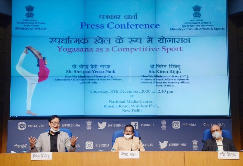 New Delhi: Union MoS AYUSH (Independent Charge) and Defence Shripad Yesso Naik and MoS Youth Affairs & Sports (Independent Charge) and Minority Affairs Kiren Rijiju during a press conference on 'Yogasana as a Competitive Sport', in New Delhi on Dec 17, 2020. (Photo: IANS/PIB)
