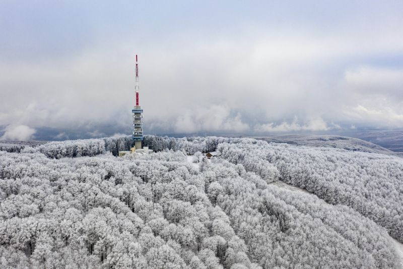 Kekesteto: Snow and hoar-frost covered trees surround a television tower near Kekesteto in the Matra Mountains, Hungary, Monday, Nov. 30, 2020. AP/PTI