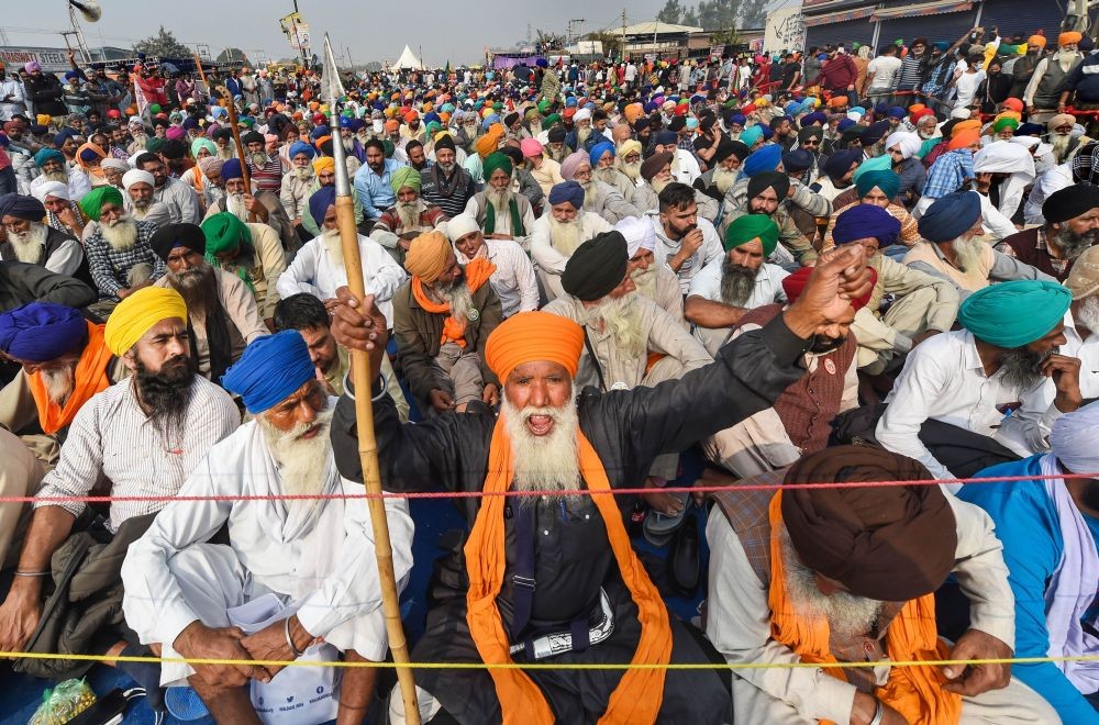 New Delhi: Farmers during their 'Delhi Chalo' protest march against the new farm laws, at Singhu border in New Delhi, Sunday, Dec. 6, 2020. (PTI Photo/Manvender Vashist)