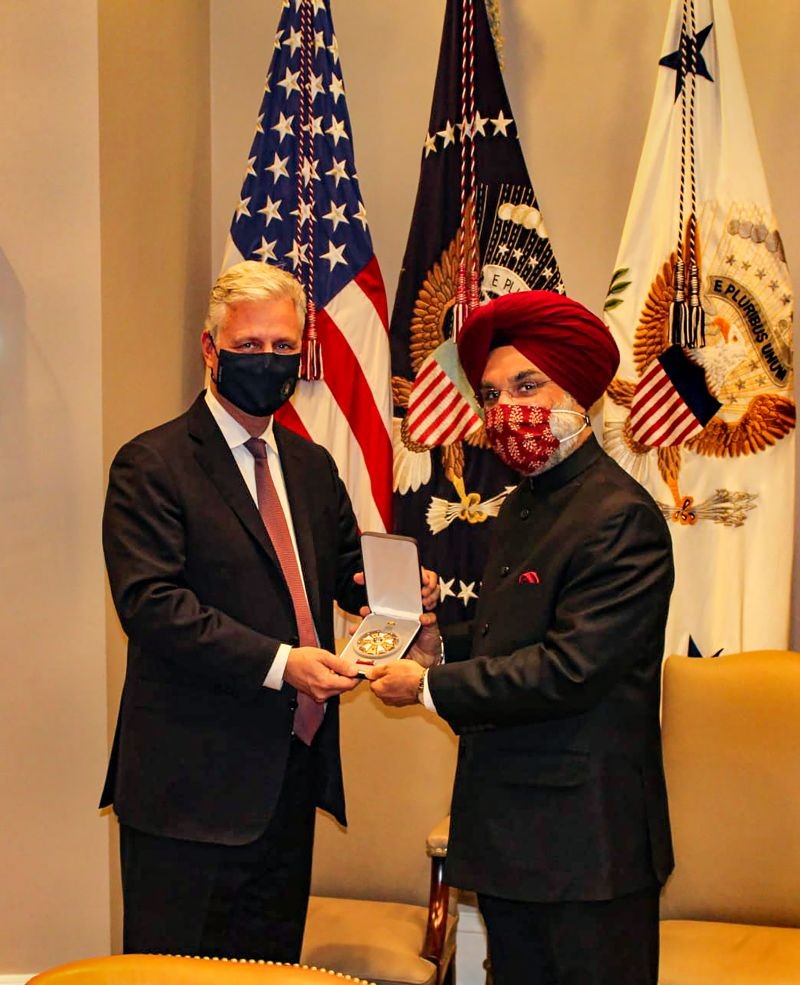 India’s Ambassador to the US, Taranjit Singh Sandhu, accepts the 'Legion of Merit' award on behalf of the prime minister from the US National Security Advisor Robert O’Brien at the White House. US had conferred the award on PM Modi in recognition of his steadfast leadership & vision for India's emergence as a global power, & his exemplary contribution for advancement of India-United States ties and promoting global peace and prosperity. (PTI Photo)