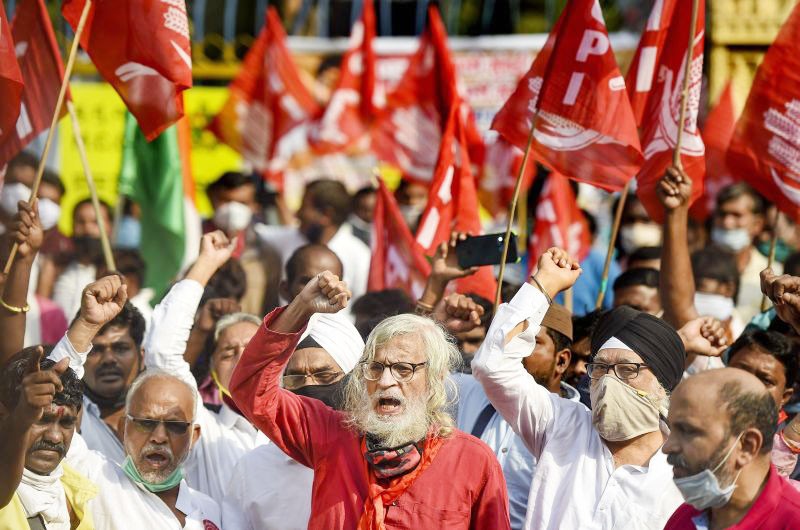Members of various farmers' organisation take part in a protest against new farm laws, at Bandra in Mumbai on December 22. (PTI Photo)