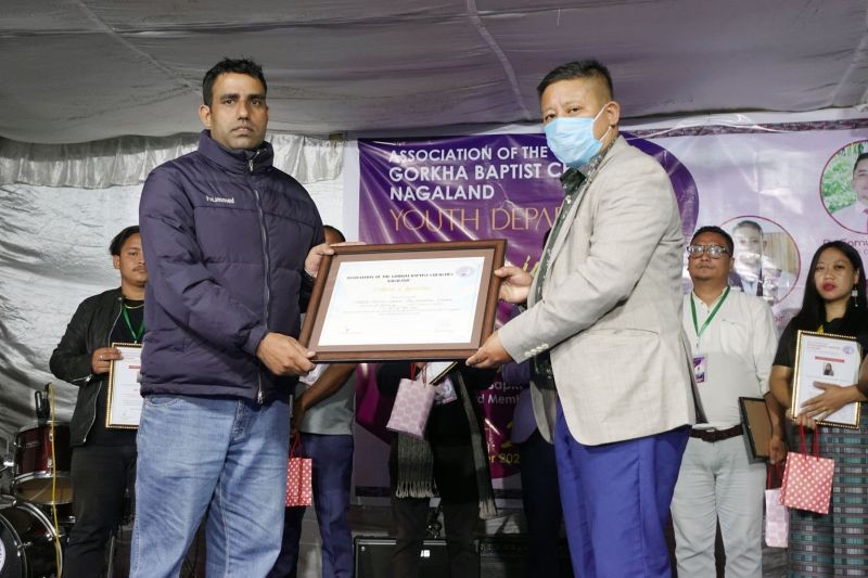 Members of the Gorkha Baptist Church, Full Nagarajan, Dimapur receiving a certificate of appreciation for hosting the 2nd AGBCN Biennial Youth Conference.