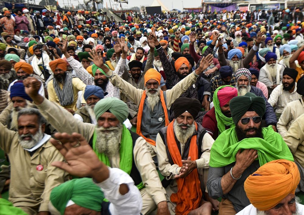 New Delhi: Farmers shout slogans at Singhu border during their 'Delhi Chalo' protest march against the Centre's new farm laws, in New Delhi, in New Delhi, Friday, Dec. 11, 2020.  (PTI Photo/Ravi Choudhary)