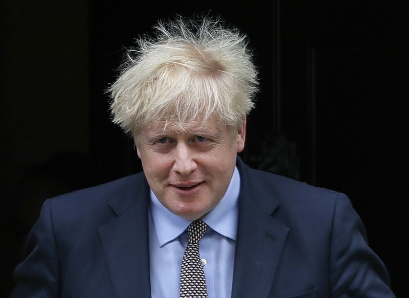 In this Wednesday, Sept. 9, 2020 file photo, Britain's Prime Minister Boris Johnson leaves Downing Street in London. The British PM has accepted India’s invitation to be the chief guest at 2021 Republic Day, on December 15, 2020. (PTI Photo)