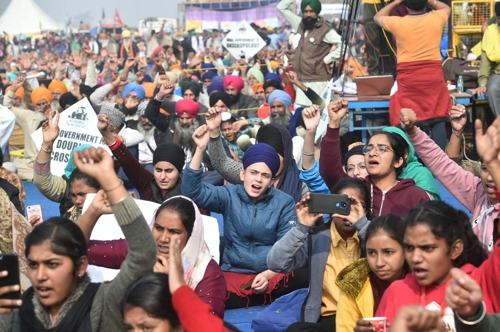 New Delhi: Children of farmers shout slogans during their protest against the Centre's new farm laws, at Singhu border in New Delhi, Saturday, Dec. 5, 2020. (PTI Photo/Arun Sharma)