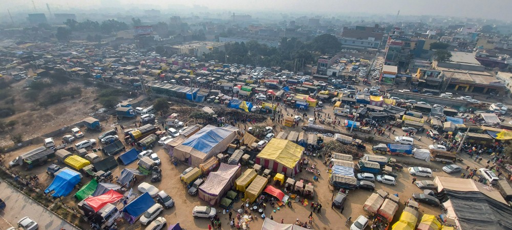 An aerial view of trolleys parked at Singhu border during farmers protest against the new farm laws, in New Delhi on December 26. (PTI Photo)