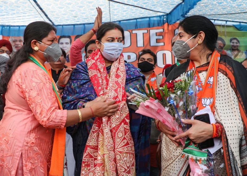 Jammu: BJP leader and Union Minister Smriti Zubin Irani is felicitated by party workers during a District Development Council (DDC) election campaign in Jammu, Friday, Dec. 4, 2020. (PTI Photo)