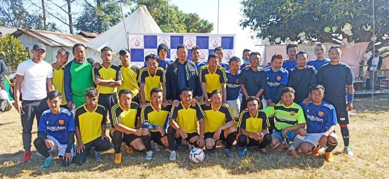Unity Club (blue) and Astute Brothers (yellow) along with the special guest Medovikho Nakhro and others before the match at Tsiepama village.