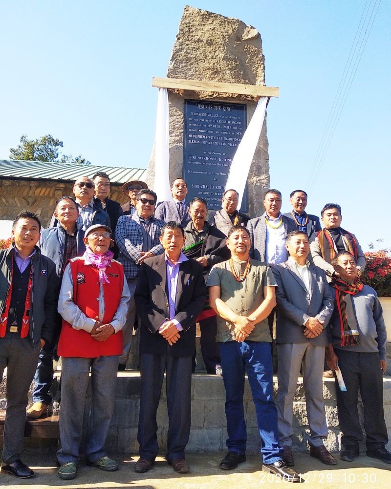 Advisor Zhaleo Rio, IAS (Retd) with village leaders after unveiling the monolith on change of nomenclature from Jharnapani to New Medziphema Village on December 29.