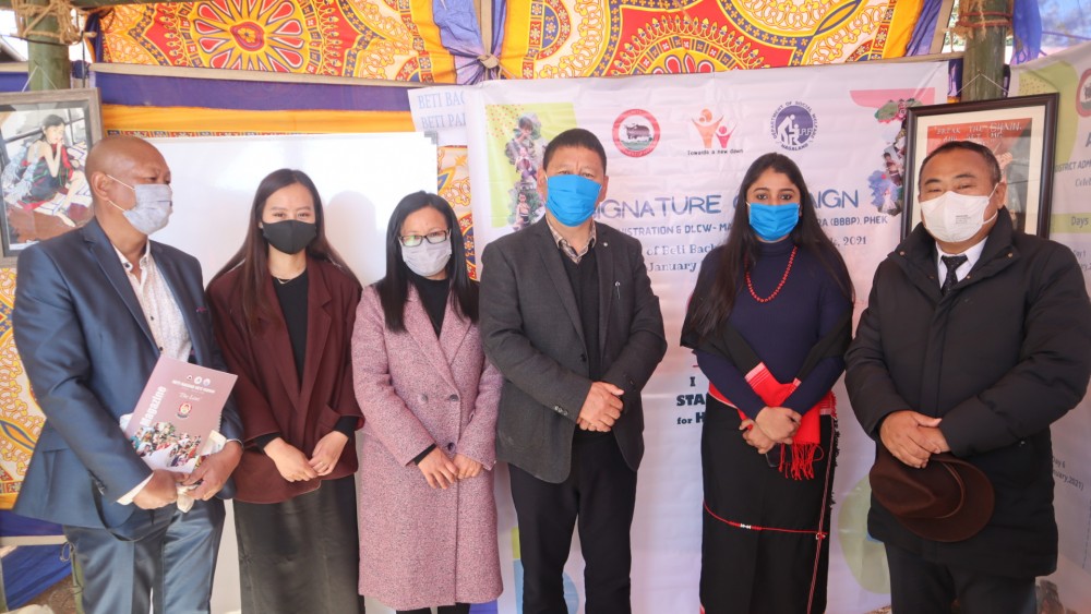 (Right to Left) Minister Neiba Kronu, N Bhavani Sri,IAS , SDO (c) Nodal Officer BBBP, Phek, Phek DC Razouvolie Dozo NCS, and others after initiating the signature campaign on the theme "I Stand for her" here at Phek on Republic Day celebration. 