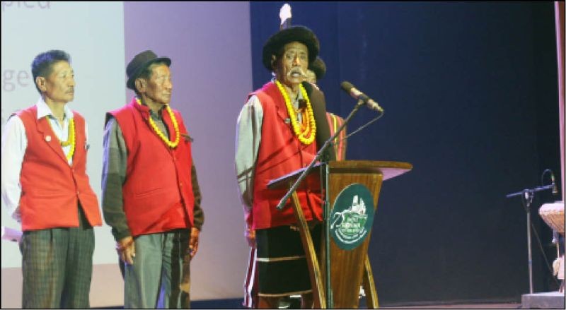 Medo Keretsü, Head GB Kohima Village Council pronouncing traditional blessing during the 75th anniversary of Battle of Kohima at Jotsoma on April 4. (Morung Photo)