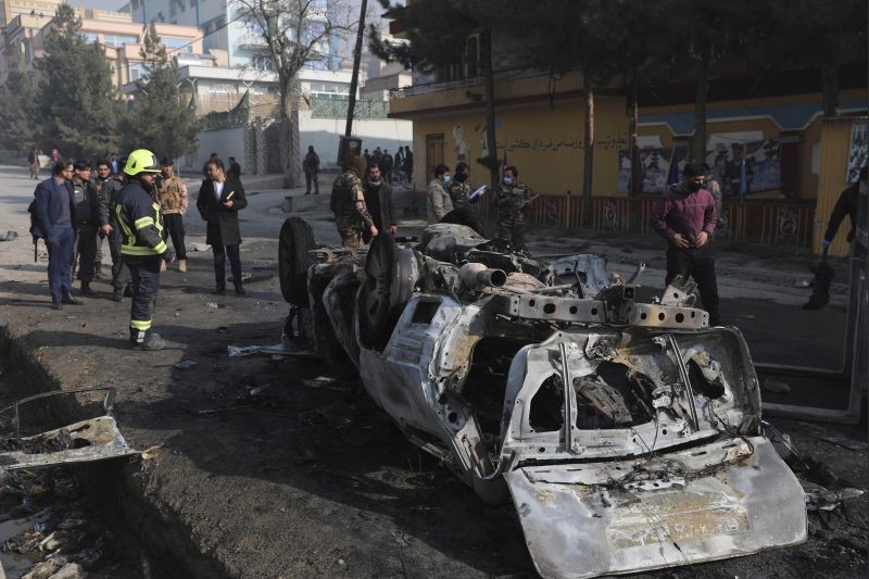Afghan security officers inspect the site of a bombing attack in Kabul, Afghanistan on January 10, 2021. A roadside bomb exploded in Afghanistan's capital Sunday, killing at least a few people in a vehicle, the latest attack to take place even as government negotiators are in Qatar to resume peace talks with the Taliban. (AP/PTI Photo)