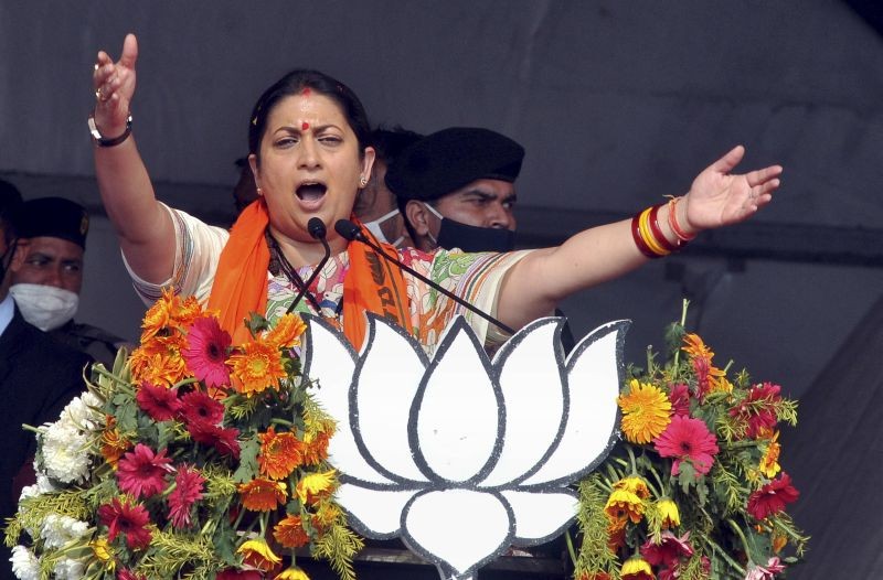 Howrah: Union Minister Smriti Irani addresses  a public rally at Domurjala Stadium in Howrah district of West Bengal, Sunday, Jan. 31, 2021. (PTI Photo)