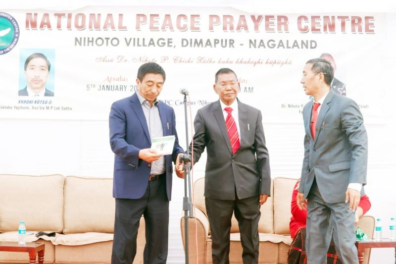 MP Tokheho Yepthomi with others during the release of biography on Dr Nihoto P Chishi ‘atto kükau’ written by Dr Hesheto Y Chishi at Nihoto Village Dimapur on January 5.