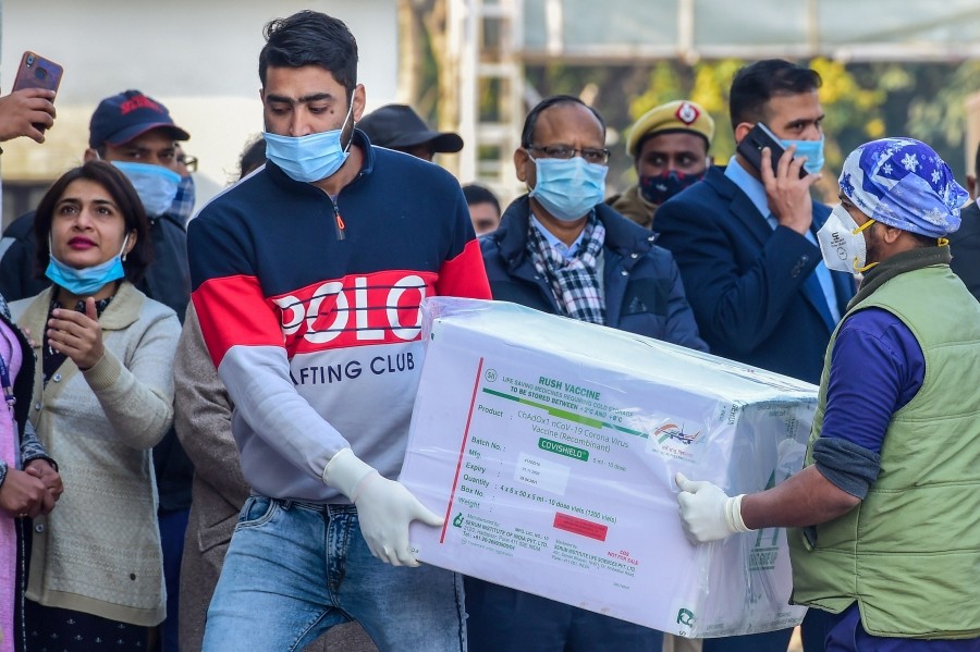 The first batch of Covishield vaccine reaches central storage facility at Rajiv Gandhi Super Specialty hospital in New Delhi, Tuesday, Jan. 12, 2021. (PTI Photo/ Kamal Kishore)