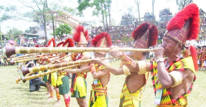 Pochury youth blow indigenous bamboo trumpet during the Yemshe festival of Pochury Nagas. (Morung Photo by Chizokho Vero)