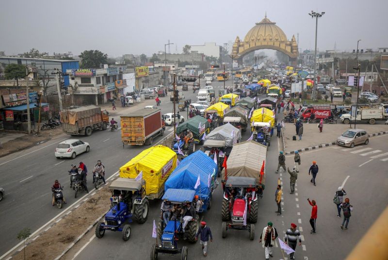 Farmers on their tractor march towards Delhi, to join the main agitation against the Center's farm laws, in Amritsar on January 12. Farmer organizations have planned to carry out a tractor march on Republic Day. (PTI Photo)
