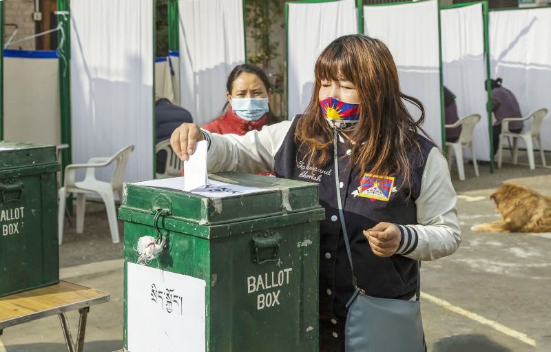 A Tibetan in exile casts her vote for the first phase of the global election for Sikyong-the head of the Central Tibetan Administration (CTA) and members of the 17th Tibetian Parliament, in Dharamsala on January 3. (PTI Photo)