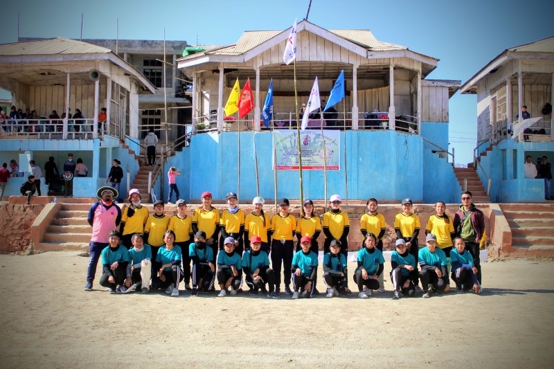 In the picture, women's teams of the exhibition match, along with their coaches, at the inaugural of the 3rd Gold Cup Cricket Tournament at Parade Ground, Tuensang.