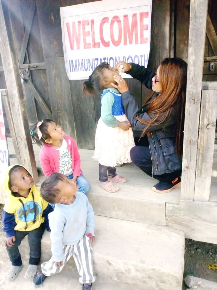 Children look on as a health worker administers polio drops to a girl child in Zunheboto district on January 31. The nationwide Intensified Pulse Polio Immunisation (IPPI) programme began on Sunday and will go on till February 2. (Photo Courtesy: CMO Zunheboto)