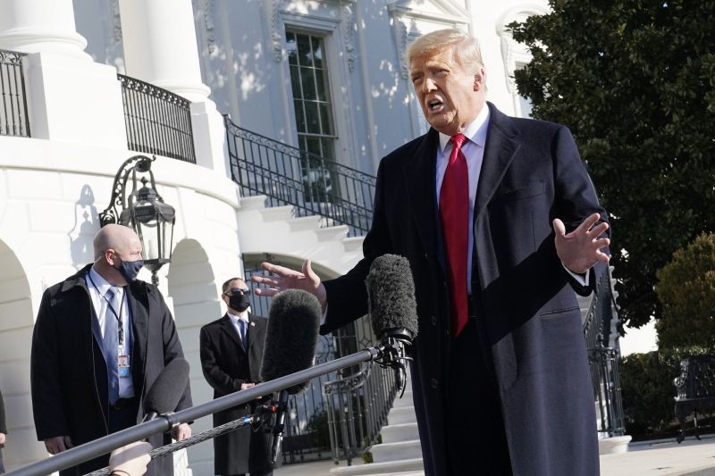 President Donald Trump talks to the media before boarding Marine One on the South Lawn of the White House on January 12, 2021 in Washington. (AP/PTI Photo)