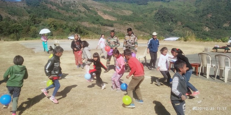 Children of Adora Children's Home, Noklak playing games during the picnic organised by the Shamatore Battalion of AR on January 1. (Photo Courtesy: HQ IGAR (N))