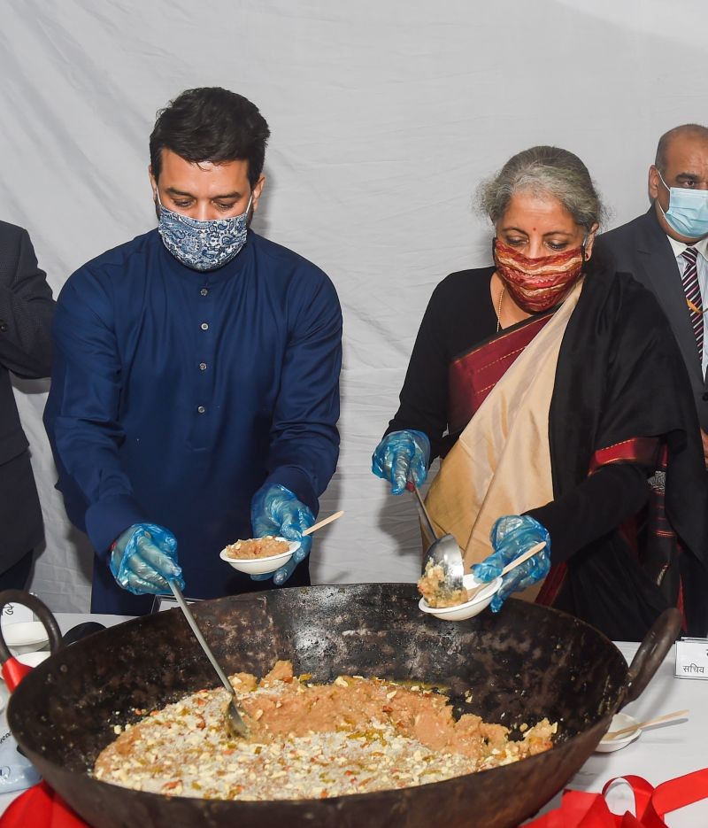 New Delhi: Finance Minister Nirmala Sitharaman along with Minister of State for Finance Anurag Singh Thakur during 'Halwa' ceremony to mark the commencement of final stage of Union Budget 2021-22 and launch of 'Union Budget Mobile App' to provide easy and quick information to all stakeholders, in New Delhi, Saturday, Jan. 23, 2021. (PTI Photo/Manvender Vashist)