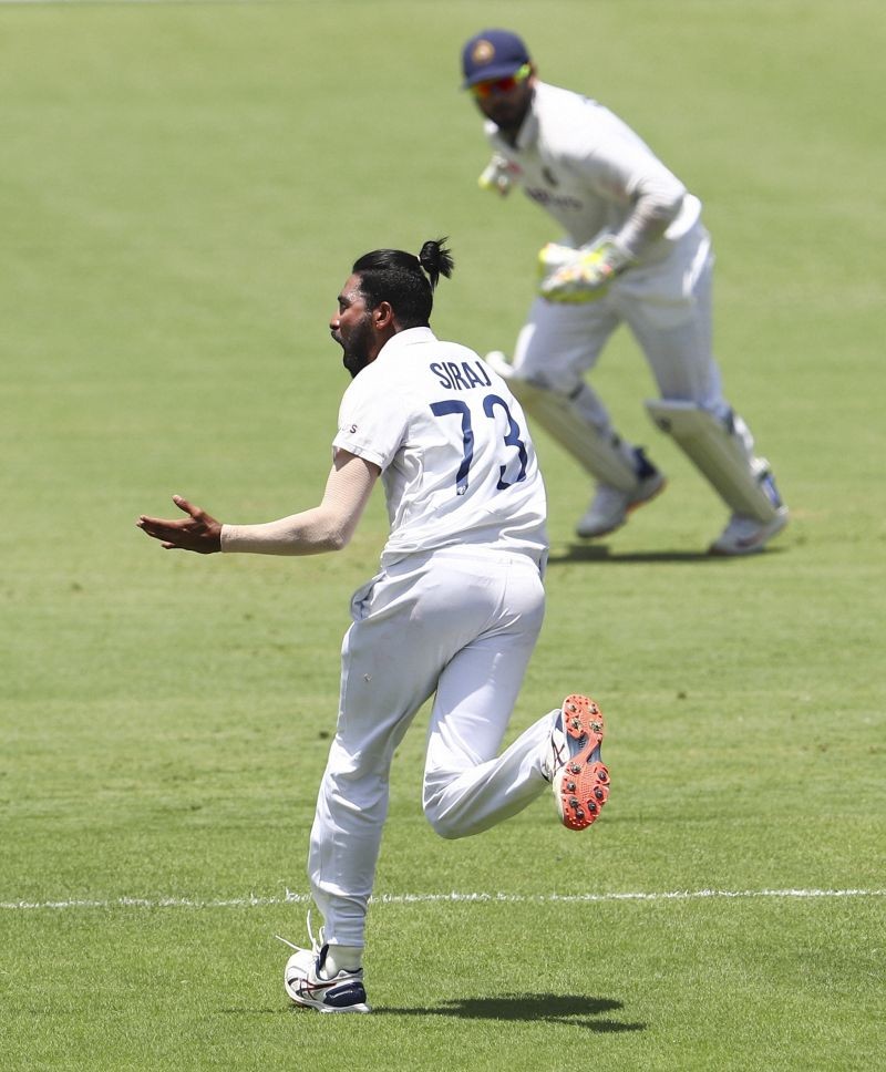 Brisbane : India's Mohammed Siraj celebrates after dismissing Australia's Matthew Wade during play on day four of the fourth cricket test between India and Australia at the Gabba, Brisbane, Australia, Monday, Jan. 18, 2021. AP/PTI(
