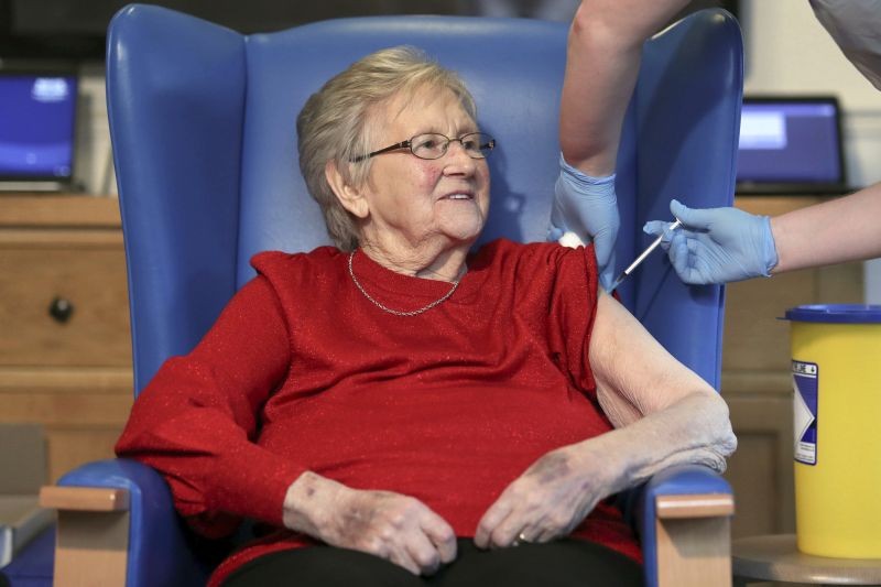 Resident Annie Innes, 90, receives the Pfizer BioNTech COVID-19 vaccine at the Abercorn House Care Home in Hamilton, Scotland on December 14, 2020.  (AP/PTI File Photo)