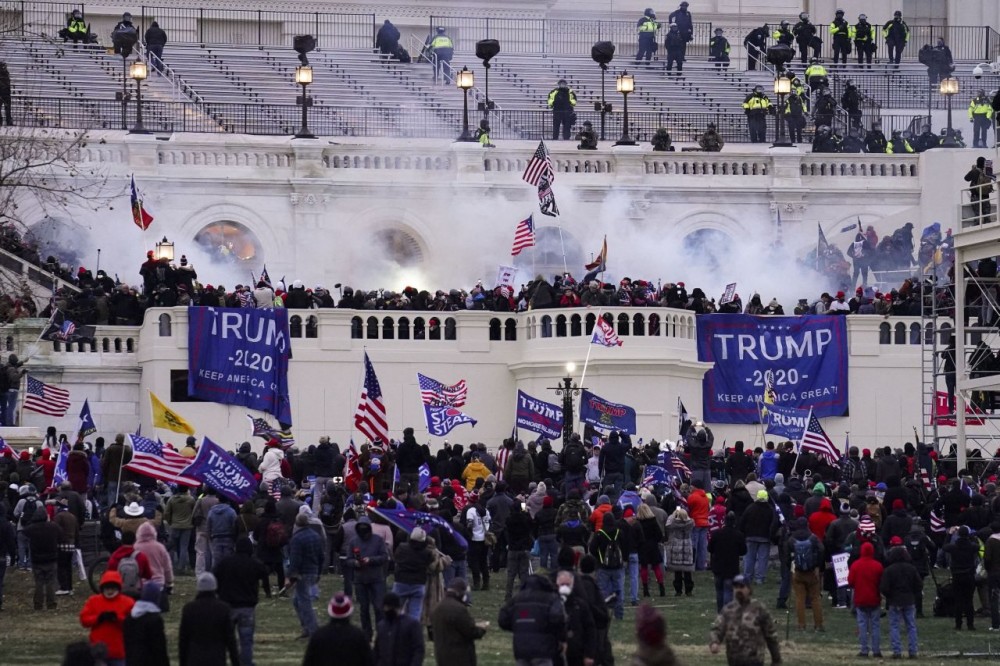 Violent protesters, loyal to President Donald Trump, storm the Capitol January  6 in Washington. It's been a stunning day as a number of lawmakers and then the mob of protesters tried to overturn America's presidential election, undercut the nation's democracy and keep Democrat Joe Biden from replacing Trump in the White House. (AP/PTI Photo)