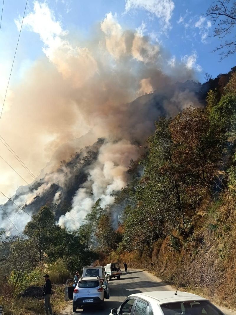 A view of the fire that broke out near St Joseph College Jakhama on January 7. (Photo Courtesy: WhatsApp)