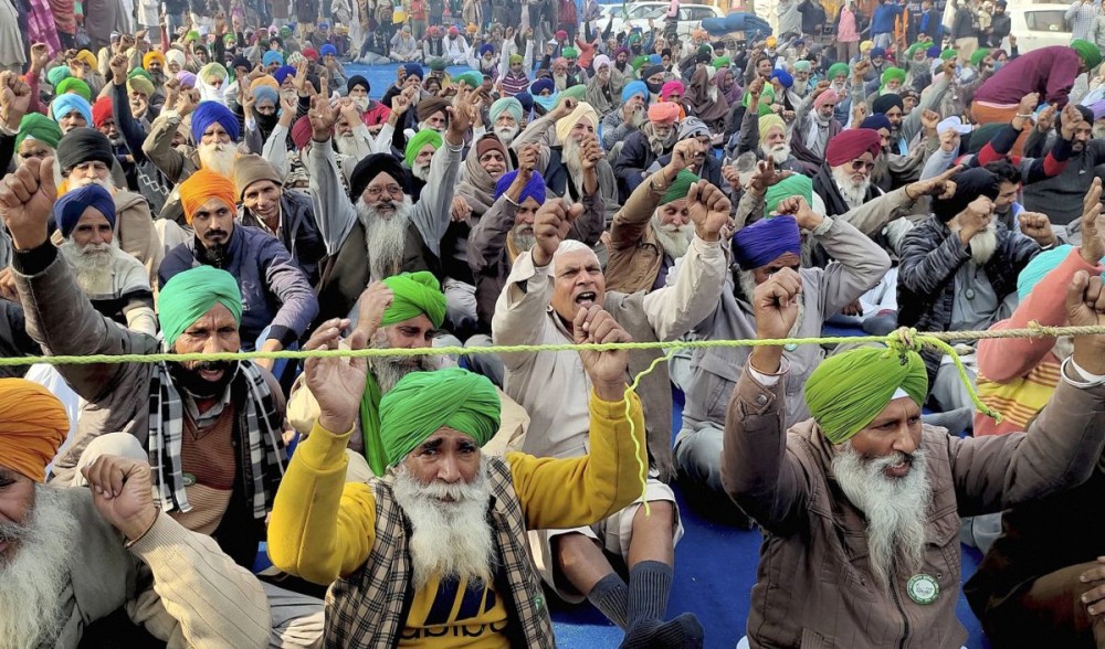 Farmers stage a protest against Centre's farm reform laws at Tikri border in New Delhi. Photograph: PTI Photo
