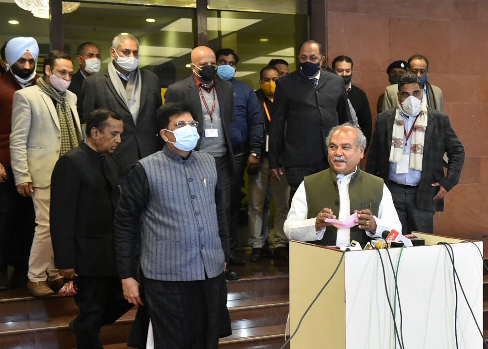 New Delhi: Union Minister for Agriculture and Farmers Welfare Narendra Singh Tomar along with Union Minister for Commerce and Industry Piyush Goyal and other dignitaries address the media after the ninth round of talks with farmer leaders over the new farm laws,  at Vigyan Bhawan in New Delhi, Friday, Jan. 15, 2021. (PTI Photo/Arun Sharma)